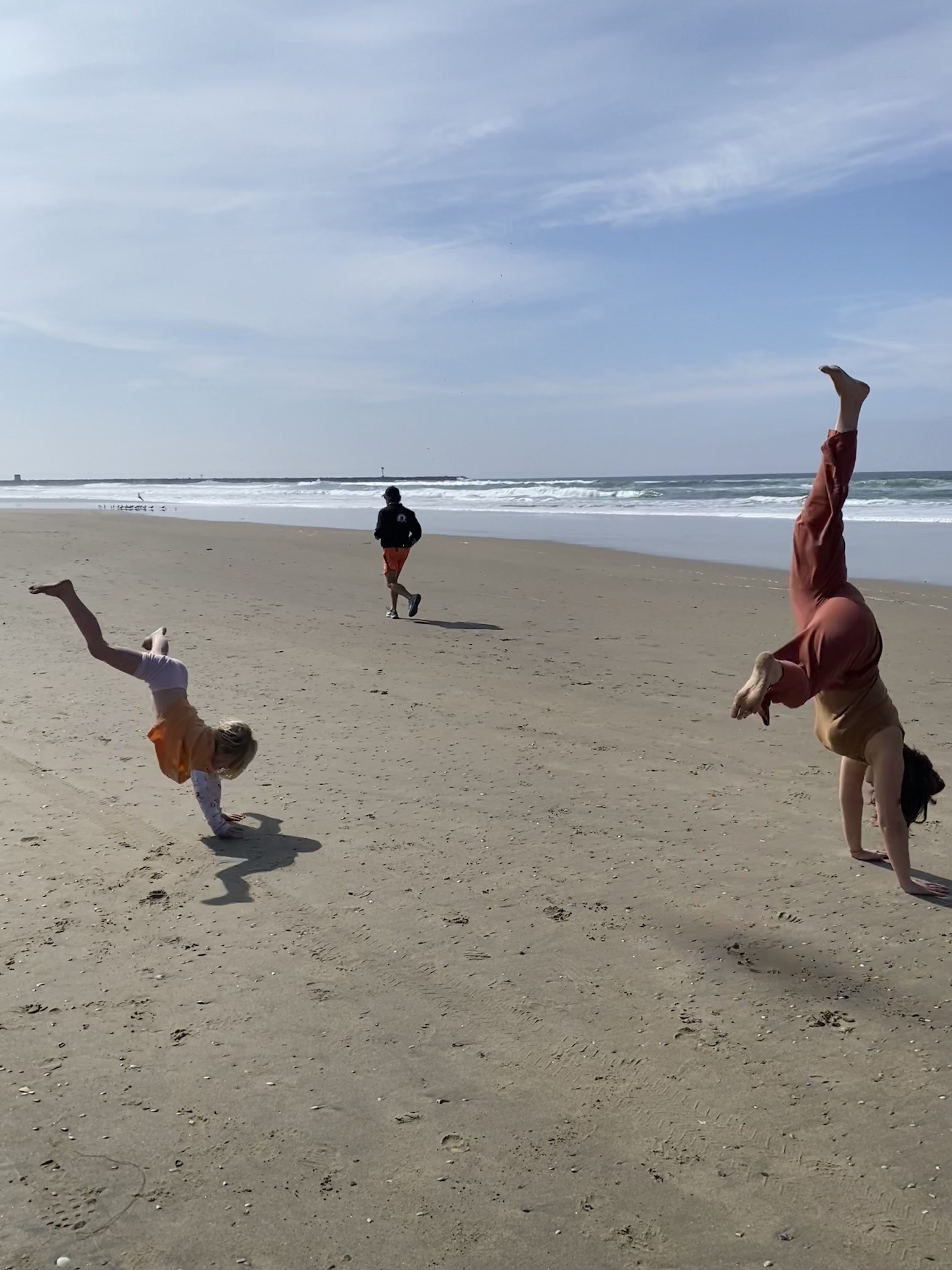 Me and Mathilda doing cartwheels on the beach