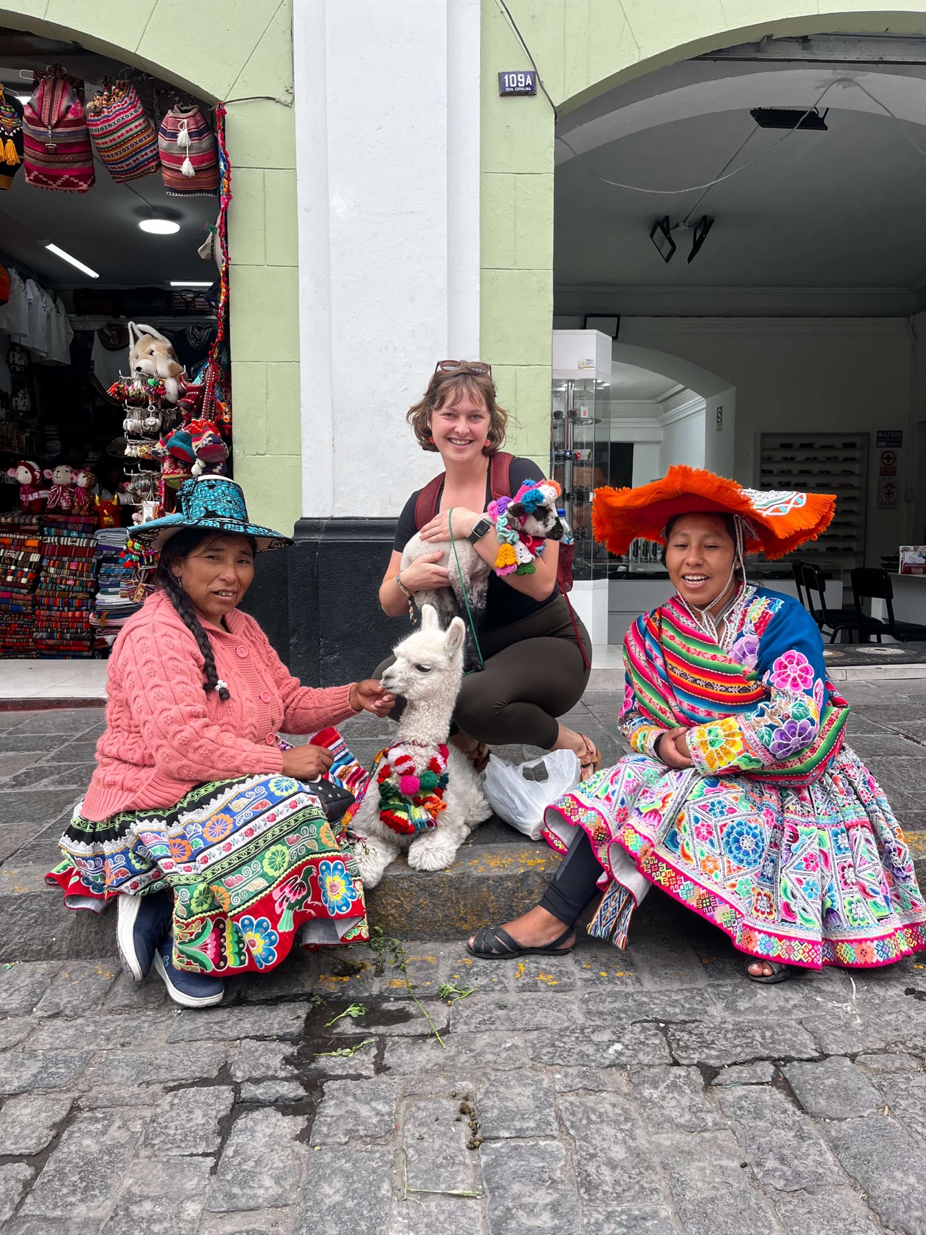 Holding a baby alpaca in Peru